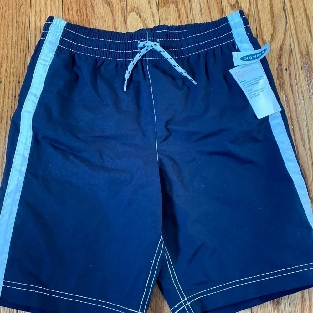 Old navy sz 10/12 navy swim trunks nwt